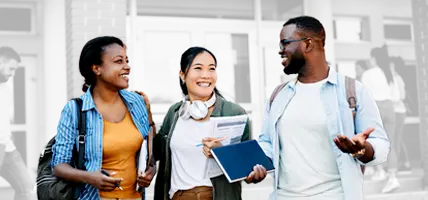 Three students talking with each other